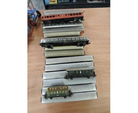 Seventeen Marklin HO scale tin plate and plastic coaches
