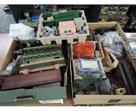 Three boxes of 00 scale accessories including Fencing, Buildings, Bridges and Tunnels etc