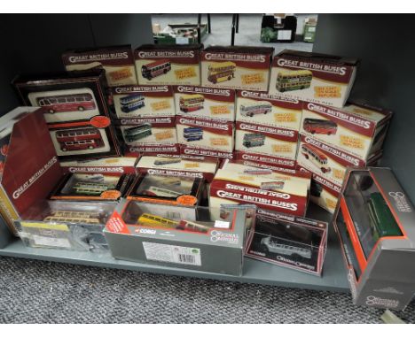 A shelf of Atlas and EFE diecast Buses, all boxed, approx 30