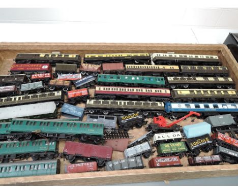 A box containing 11 00 scale Coaches, 5pc SR Electric Train and 30 Wagons