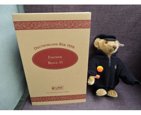 A modern Steiff limited edition Bear, Germany Bear 1998, Fisher, beige 35, white tag 670114, with certificate 01638/2000, hav