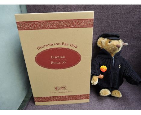 A modern Steiff limited edition Bear, Germany Bear 1998, Fisher, beige 35, white tag 670114, with certificate 01755/2000, hav