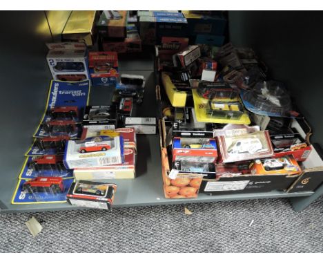 A shelf of modern diecasts including Corgi, Dinky, Majorette etc, all boxed approx 70