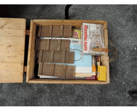 A wooden Ammo box containing 00 scale Buildings and Kits