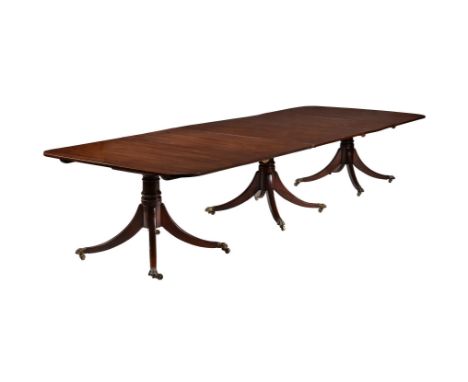 A George IV mahogany three pillar dining table, circa 1825, with two additional leaves, 69cm high, 133cm wide, 237cm long (un