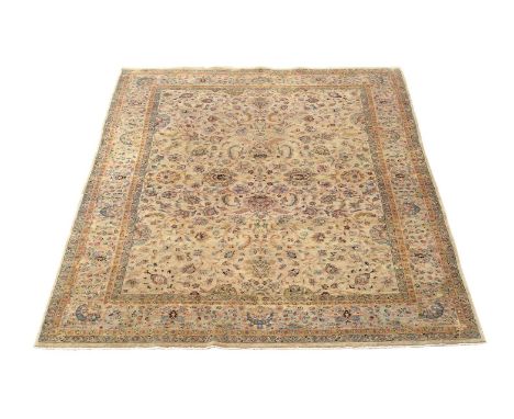 A Tabriz carpet, approximately 355 x 267cmCondition Report: Wear to carpet overall. Surface dirt, could benefit from cleaning