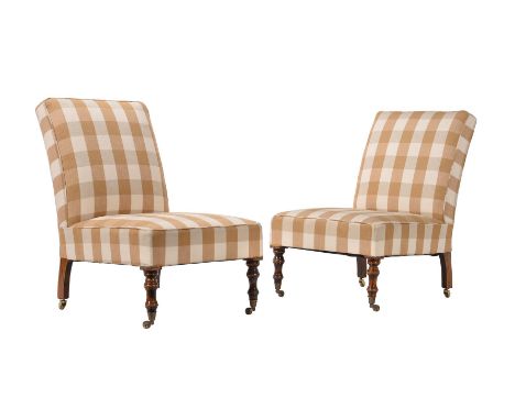 A pair of low side chairs in Victorian taste, 20th century and later upholstered, with mustard and cream woven check fabric p