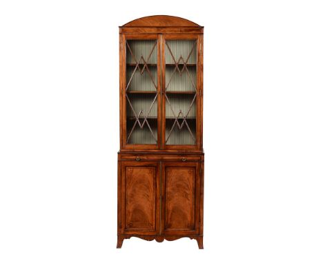 A mahogany bookcase, with two glazed doors, a leather inset slide and two panelled doors, 203cm high, 76cm wide, 35cm deepCon