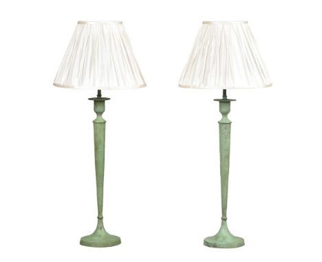 A pair of 'verdi gris' patinated metal lamp bases, second half 20th century, converted to electricity, with two pleated white