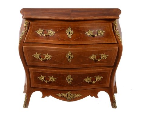 Y  A French chestnut and kingwood banded commode in Louis XV/XVI transitional style, late 19th century, of bombe outline, 81c