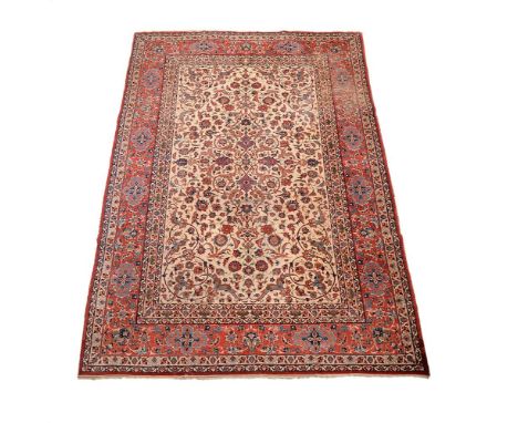 An Isfahan carpet, approximately 347 x 238cm Condition Report: Wear to carpet overall. Various areas of wear reveal underlyin