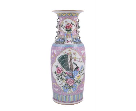 A large Chinese Famille Rose vase, late 19th century, decorated in polychrome enamels with exotic birds and flowers in panels