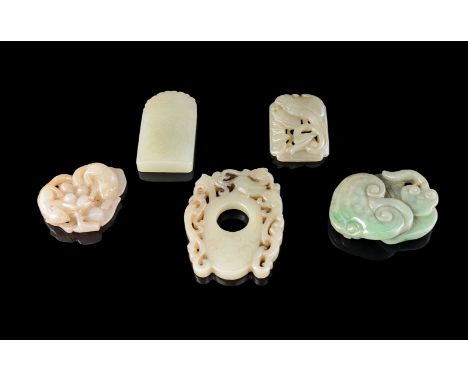 A group of five Chinese jade plaques and pendants, including a jadeite 'Lingzhi Fungus' group, 6cm long; a celadon jade archa