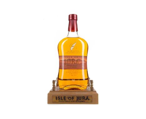 JURA 16 YEAR OLD AND BRANDED PLINTHSingle malt.With deer outnumbering people by around 25 to 1, it’s surprising the isle of J