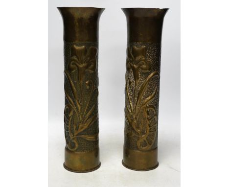 A pair of Trench Art shell case vases, 35cm. Condition - fair