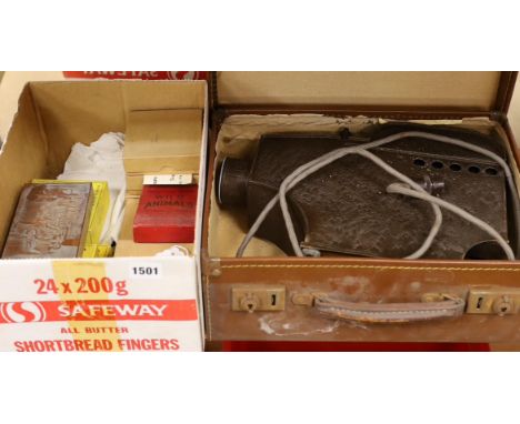 A cased Ensign Optiscope No.5 Magic Lantern projector and slides. Condition - poor-fair