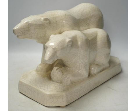An Art Deco polar bear figure group, 34cm long. Condition - heavily crazed but good Small chip to tip of larger bear’s snout;