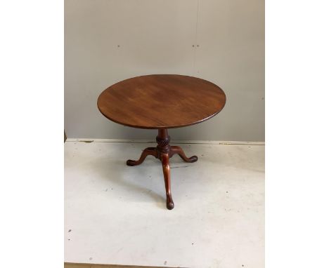 A George III circular mahogany tilt top bird cage tripod tea table, diameter 82cm, height 71cm. Condition - fair