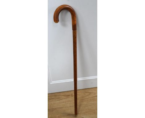 An early 20th century metamorphic walking stick, containing an aluminium camera tripod, 89cm long. Condition - good