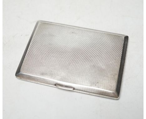 A George VI engine turned silver cigarette case, Birmingham, 1948, 11.6cm. Condition - fair