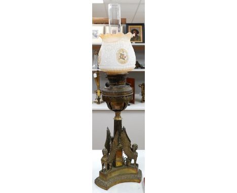 A Victorian brass ‘sphinx’ oil lamp with glass shade. Condition - fair to good Typical signs of wear and tarnish. The glass s