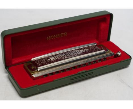 A cased Hohner Super Chromonica 270. Condition - good