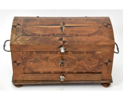 A 19th century German inlaid walnut dome top trunk of small proportions, height 36cm, width 59cm, depth 27cm.