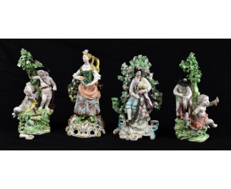 DERBY; a pair of 18th century dry edge porcelain figures of putti, one pair with a spade and rake, the other pair of putti wi