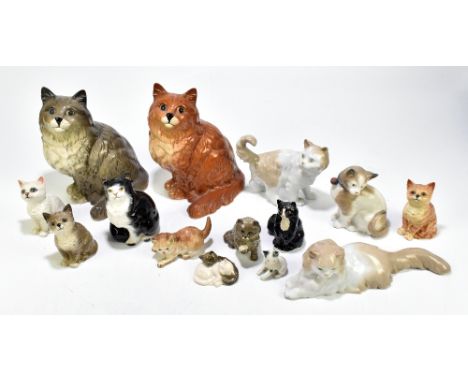 BESWICK; two large models of seated cats, height 21cm, three smaller cats, three Royal Doulton cats and another of two kitten