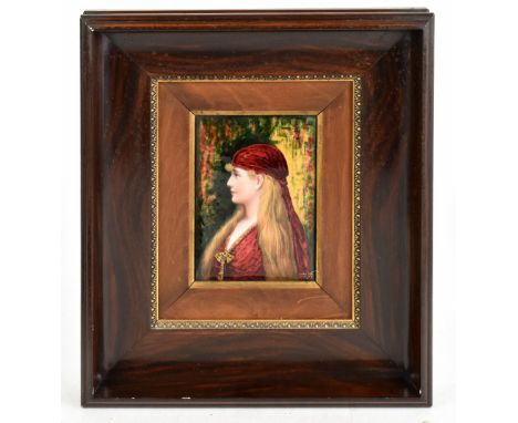 LIMOGES; an enamel portrait plaque of a maiden by Soustre, the maiden with long blonde hair and wearing a crushed velvet hat 