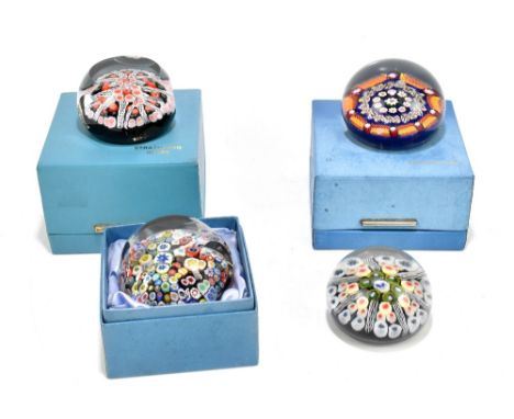 STRATHEARN; four Scottish glass paperweights, including a faceted example with millefiori decoration, also a similar example,