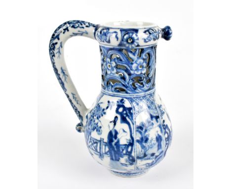 An 18th century Chinese porcelain blue and white puzzle jug painted with figures inside panels, height 20cm.Additional Inform