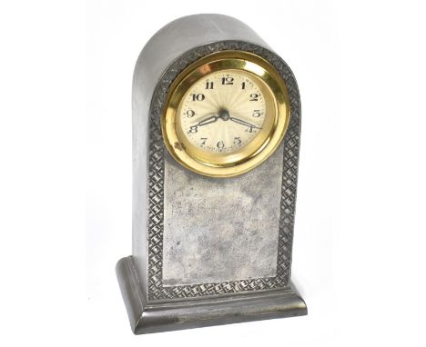LIBERTY & CO; a pewter mantel clock, no.01151 with Arabic numerals to the engraved dial within a stylised border to the arche