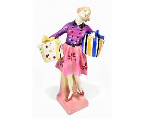 LESLIE HARRADINE FOR ROYAL DOULTON; a rare figure, HN1289 'The Midinette' (first version, Model 598), introduced 1928, withdr