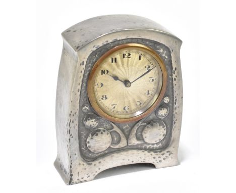 LIBERTY & CO; a Tudric pewter clock, no.01424 , with Arabic numerals to the circular dial and hammered and raised stylised de