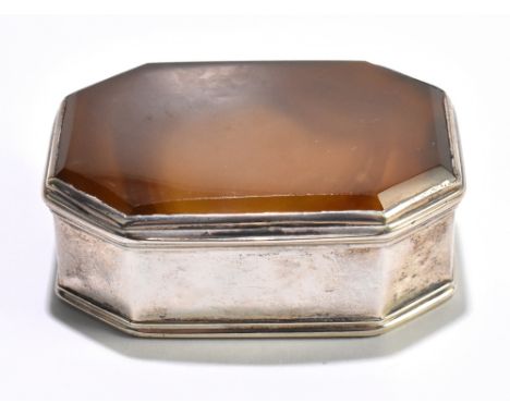A 19th century Continental white metal snuff box with hardstone top of shaped rectangular form, indistinctly stamped SS(?) to