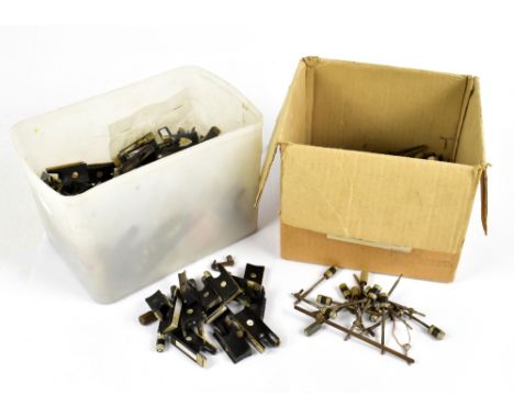 A quantity of bow frogs, end screws, etc, including silver mounted examples and a gold example.