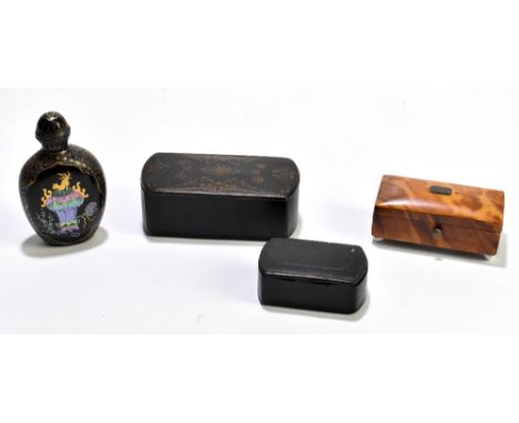 A Victorian papier-mâché snuff box of shaped rectangular form with gilt highlights, width 8.5cm, together with a 19th century