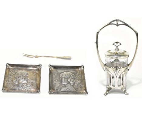 WMF; a polished metal preserve jar stand, the frame with pierced stylised decoration, with detachable glass liner and cover, 