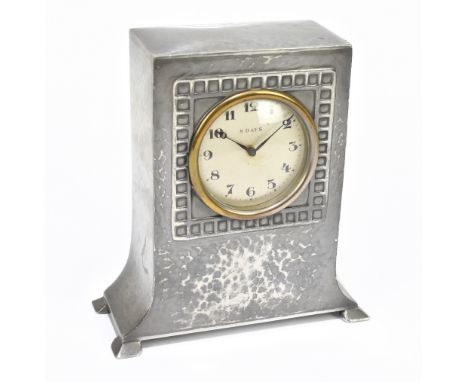 LIBERTY & CO; a Tudric pewter eight day mantel clock, no.01406, with hammered shaped rectangular case, Arabic numerals to the