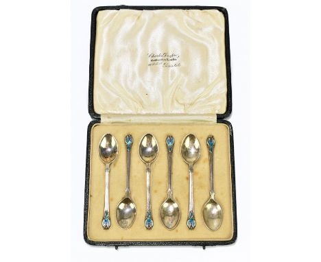 LIBERTY & CO; a cased set of six George V hallmarked silver and blue/green enamel decorated coffee spoons, Birmingham 1935/36