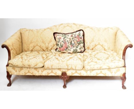 A large upholstered sofa with carved wooden frame in the Irish style, width 190cm, depth 80cm, height 80cm.