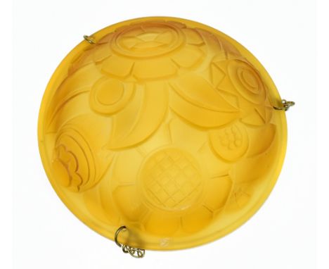 An Art Deco amber moulded glass plafonnier with embossed geometric floral decoration, diameter 35cm.Additional InformationBru