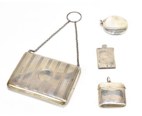 SMITH &amp; BARTLAM; a George V hallmarked silver evening purse with engine turned linear decoration surrounding a vacant cir
