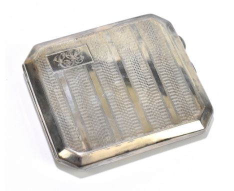 JOSEPH GLOSTER LTD; a George V hallmarked silver cigarette case of shaped rectangular form with engine turned decoration and 