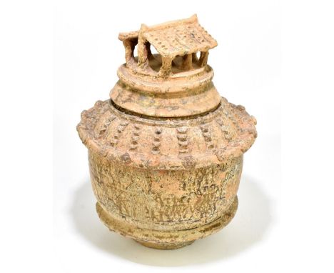 A large Chinese Song Dynasty (960 - 1279 AD) jar and cover, with roof finial, height 43cm.Please note: This lot has been ther