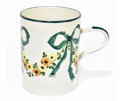 WEMYSS WARE; an oversized mug painted with swags and foliage, impressed marks and initialled R.H &amp; S, height 14.5cm.Addit