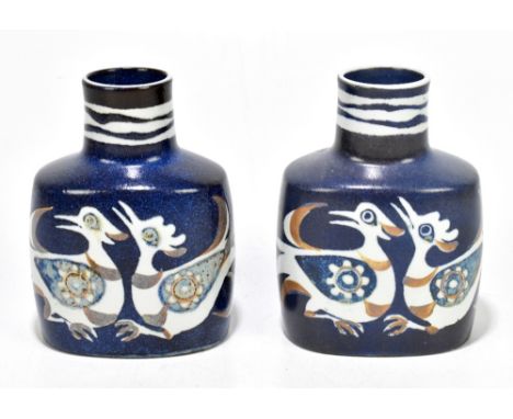 NILS THORSSON FOR ROYAL COPENHAGEN FAIENCEWARE; a pair of bottle vases decorated with stylised birds, height 13cm (2).Additio
