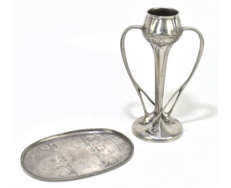 ARCHIBALD KNOX FOR TUDRIC; a pewter dish of oval form embossed with stylised motifs, width 21.5cm, impressed marks and number