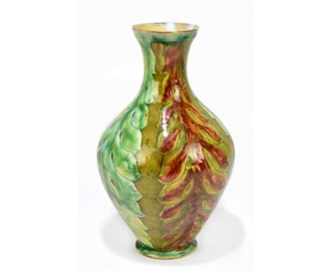 LIZZIE WILKINS FOR DELLA ROBBIA; an Art Pottery vase of belly form with stylised floral detail, inscribed marks and painted i